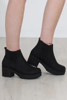 Black Faux Leather Ankle Boots by Zohey