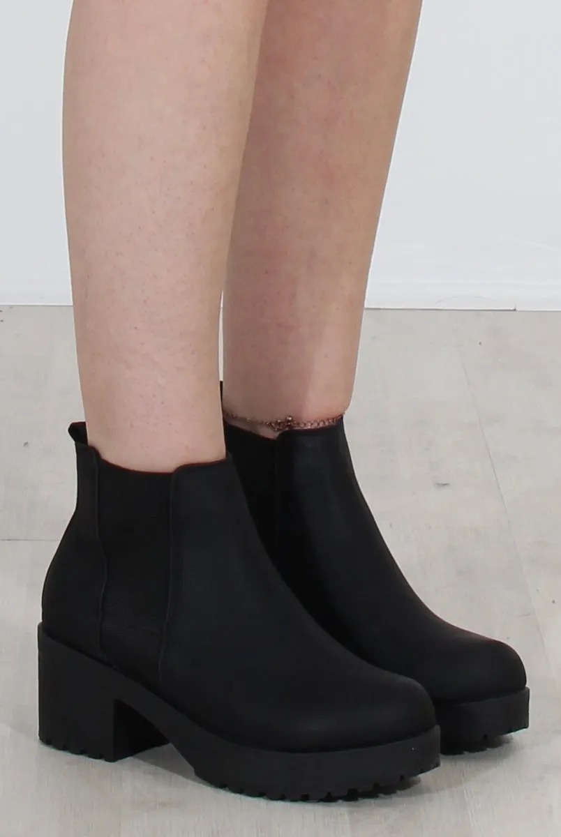 Black Faux Leather Ankle Boots by Zohey