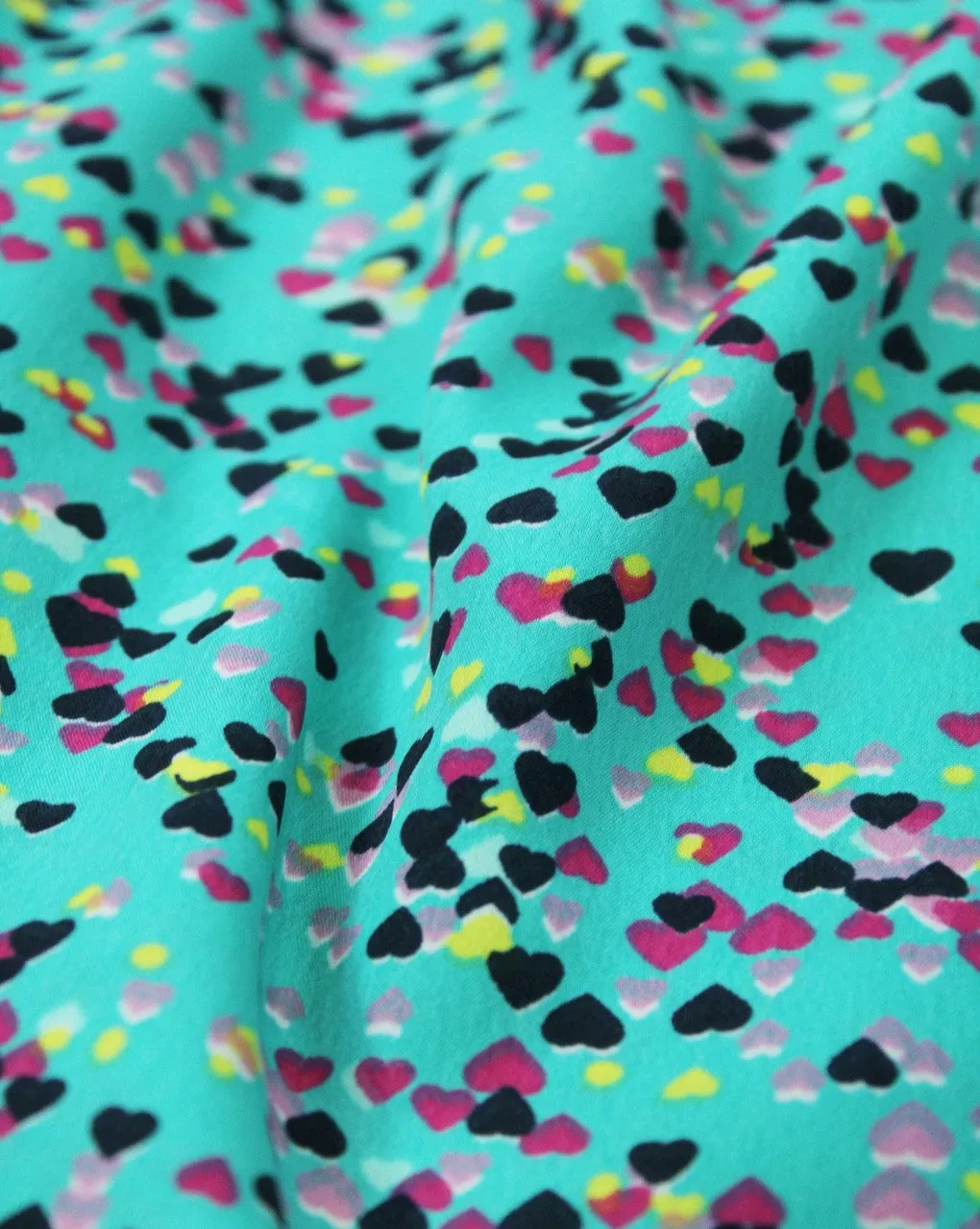 Polyester Heart Print Crepe Fabric in Green and Multicolor