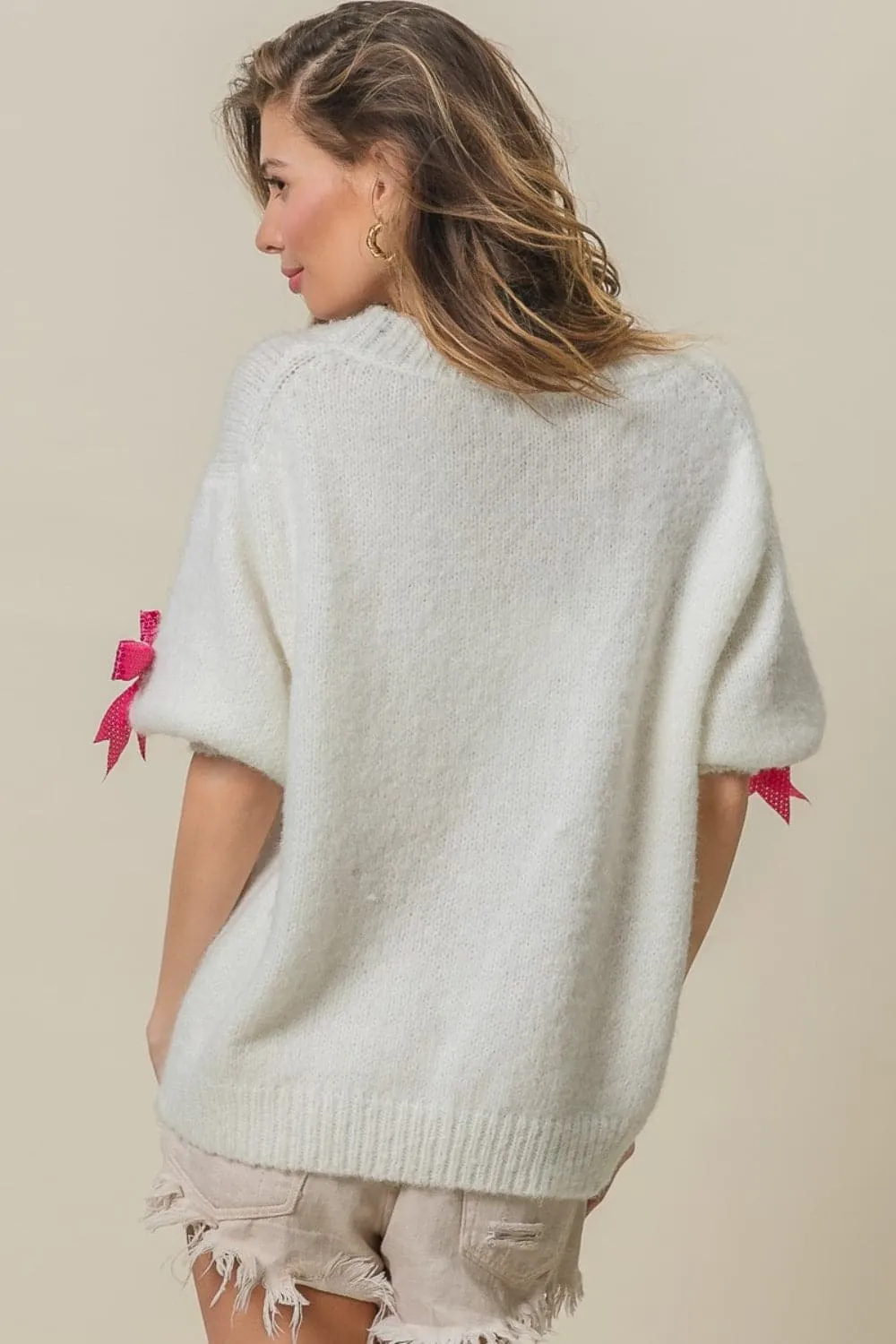 Sequin Bow Puff Sleeve Sweater by BiBi - Shop Now