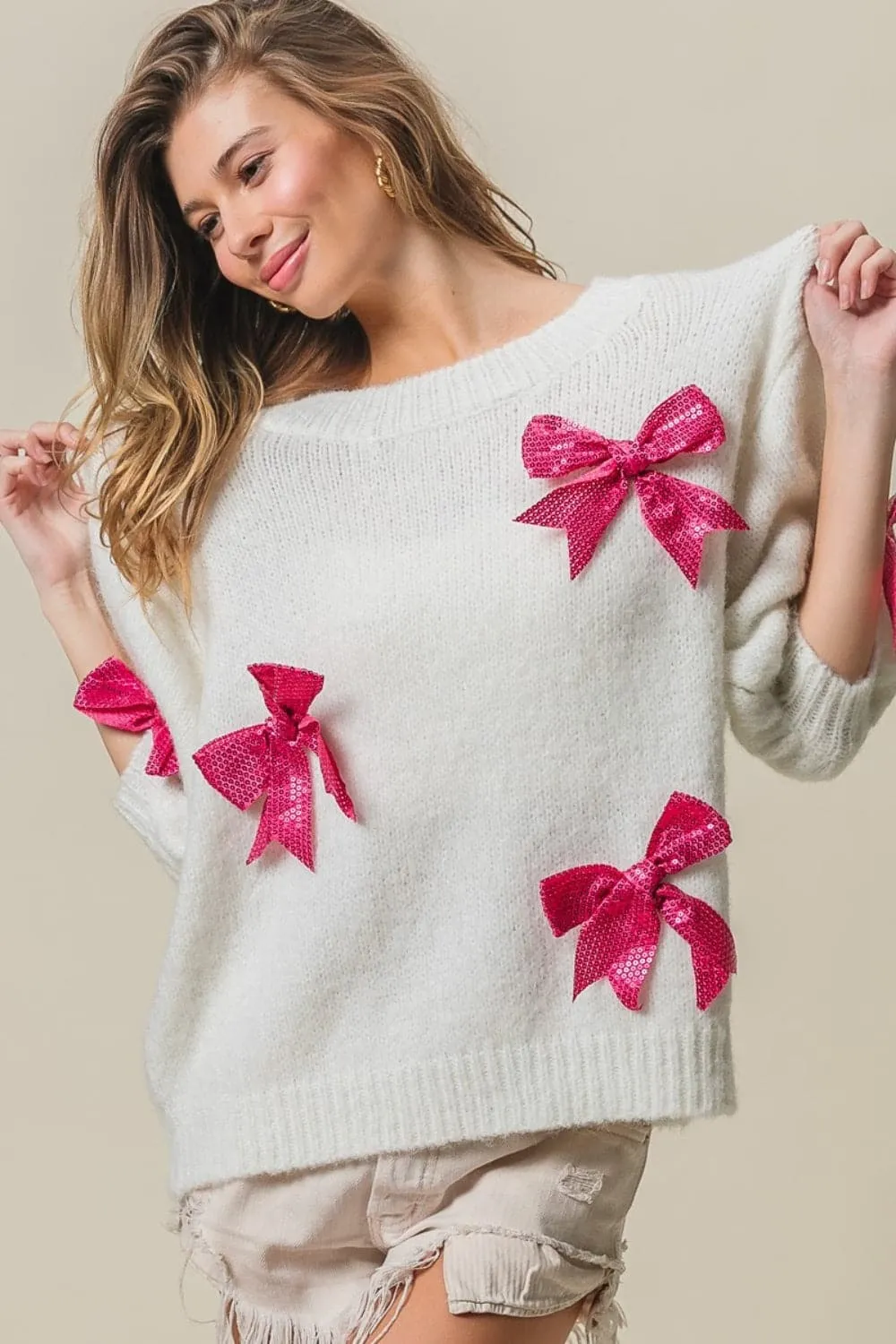 Sequin Bow Puff Sleeve Sweater by BiBi - Shop Now